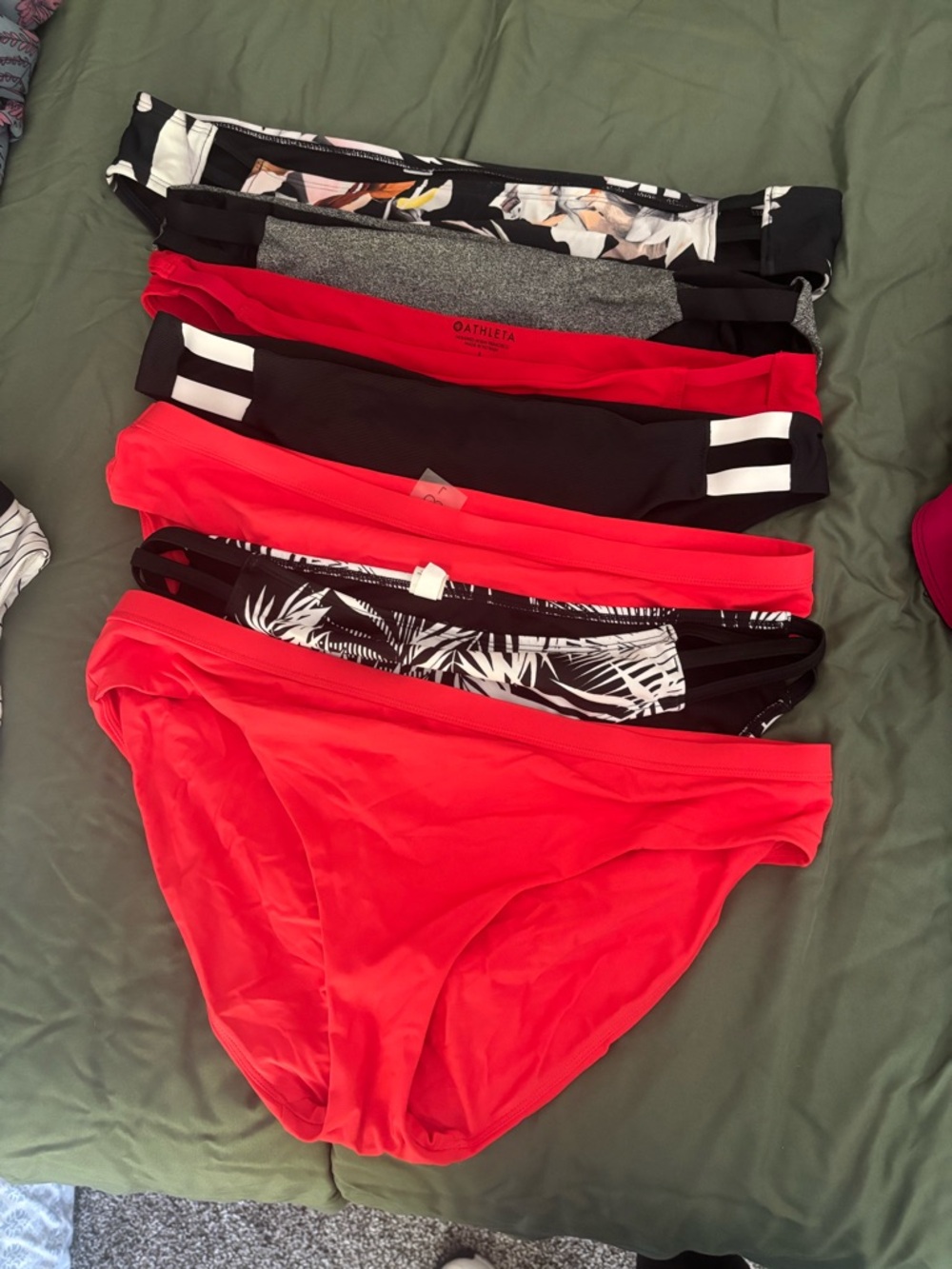 Women bikini bottoms. 7 large, three XL athleta bikini bottoms only